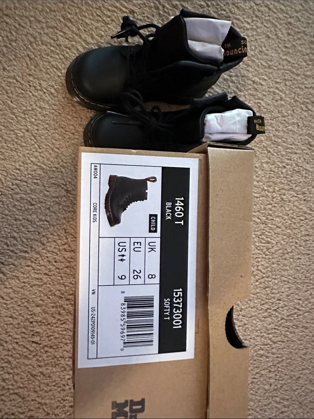 Dr. Martens Black Leather Ankle Boots with Yellow Welt Stitching